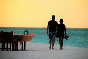 served table on the beach for lovers