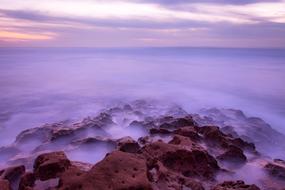 seashore in the haze at dusk