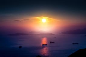 panoramic view of the port in hong kong at dusk