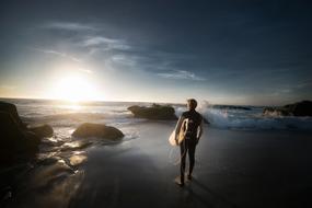 Beach person surfboard