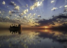 mirror reflection of clouds in the lake during dawn