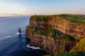 The Cliffs of Moher are sea cliffs located at the southwestern edge of the Burren region in County Clare, Ireland