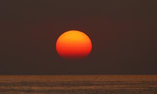 Mediterranean orange red sun