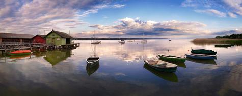 boats on the shore of lake Ammersee, Germany
