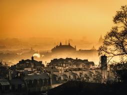 Beautiful Paris city in fog at beautiful and colorful sunrise in France