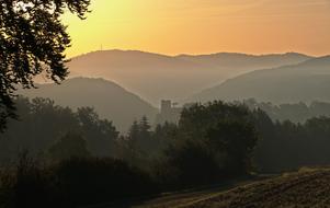 Sunrise Fog silhouettes mountains