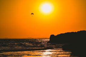 skydiver in the sky over the coast of cyprus