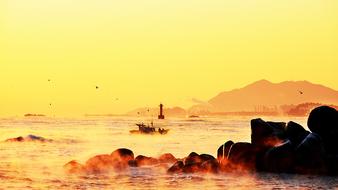 fishing boats near coast at Sunrise, korea