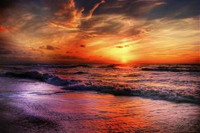 colorful sky above the surf at dusk