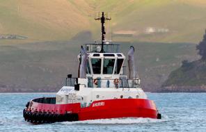 tug at sea near the port