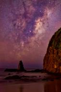 rocks on the coast of australia in pink twilight