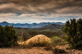 gray storm clouds over a mountain range