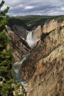 Beautiful landscape of the waterfalls, on the colorful mountains in the Yellowstone National Park, in Wyoming, USA