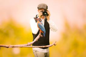 Photographer and exotic hummingbird