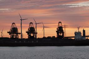 evening sky above the silhouettes of the port