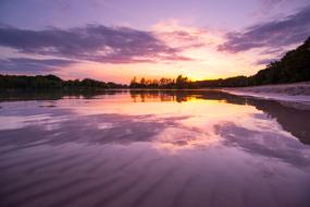 purple twilight reflected in calm water
