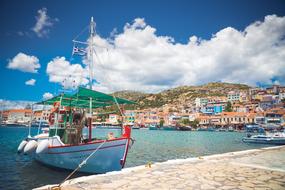 wooden boat on the dock on a sunny day