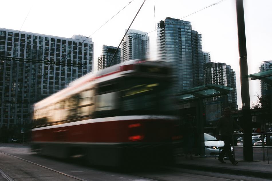fast streetcar against the backdrop of buildings