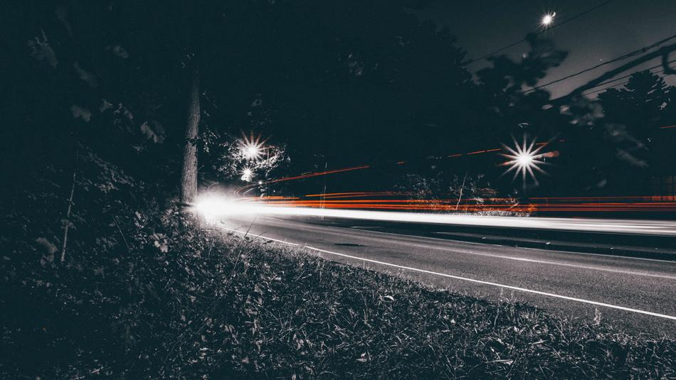 light from car headlights on the road