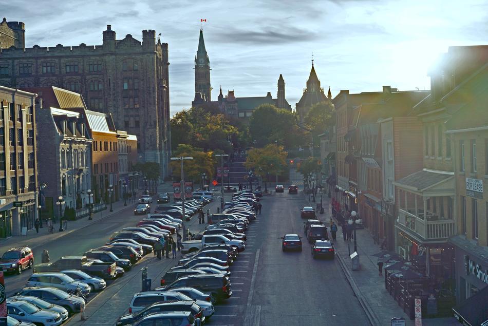 Architecture and cars at sunset