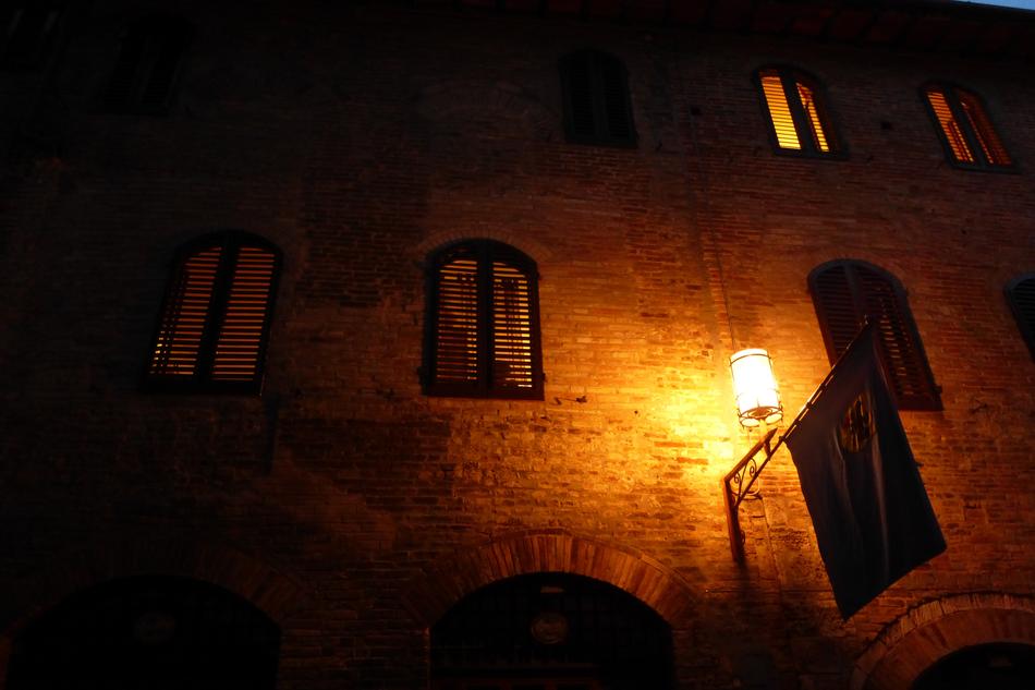 burning lantern by the building view