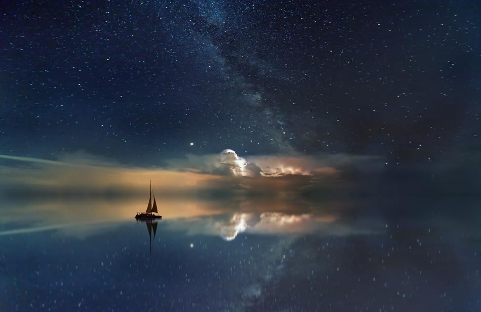milky way over the ocean at night