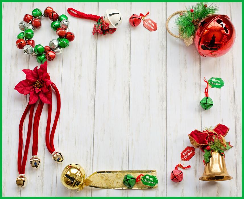 Beautiful and colorful Christmas frame made of the decorations, on the wooden surface