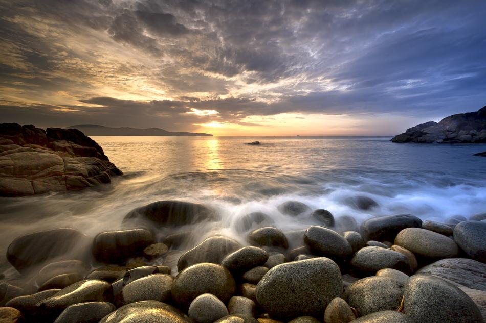 stones in the ocean waves in the morning