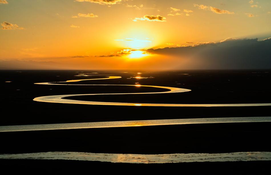 Beautiful landscape with the curved river, at colorful sunset