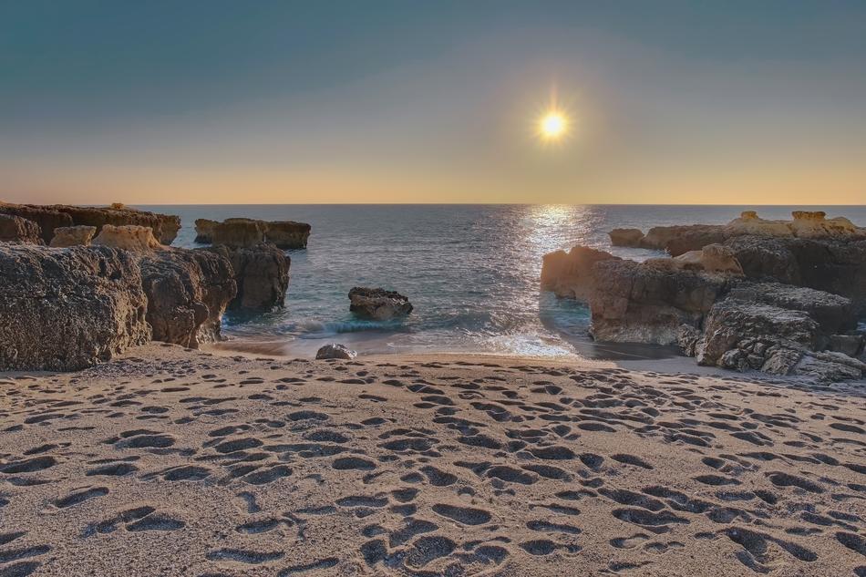 enchanting Beach with the sunset on the water
