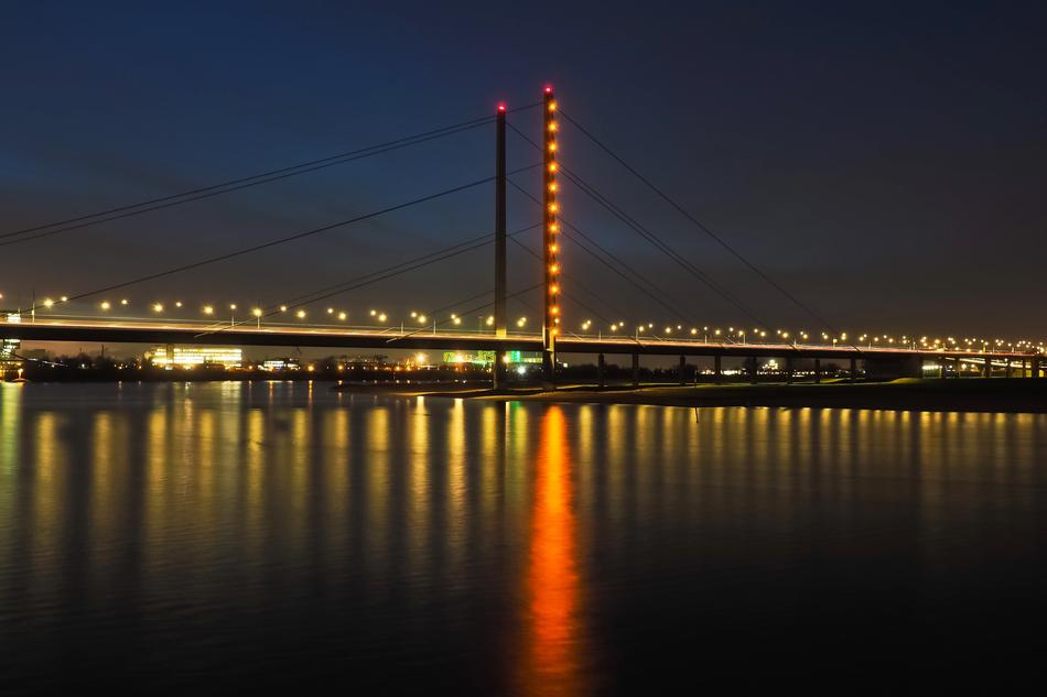 illuminated bridge over Rhine in Düsseldorf