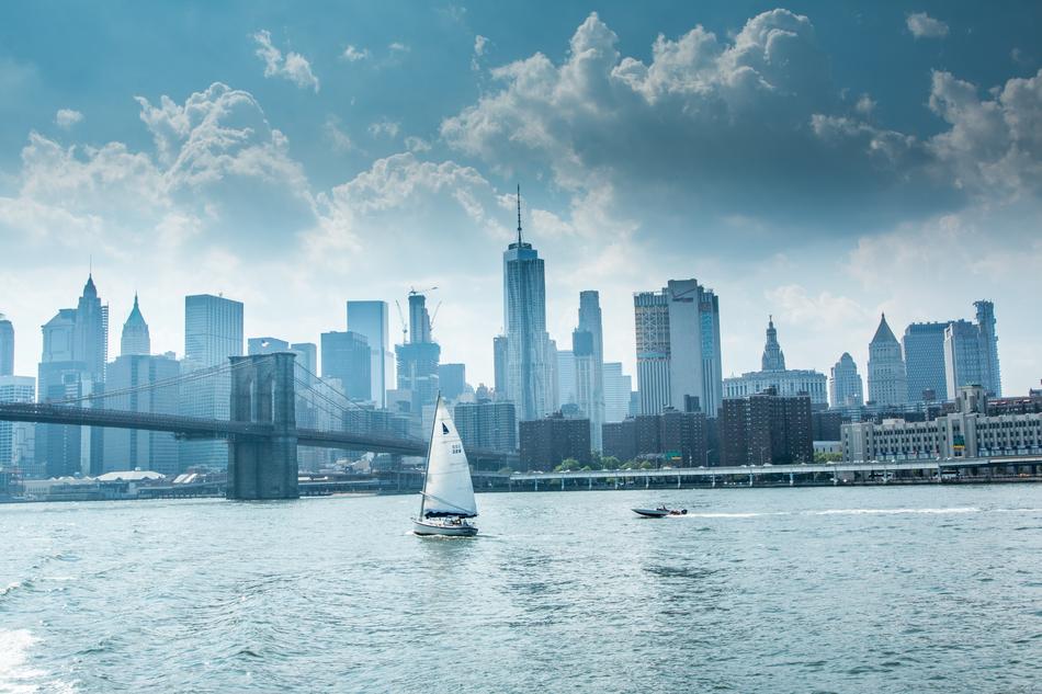 sailboat on the water against the backdrop of Manhattan