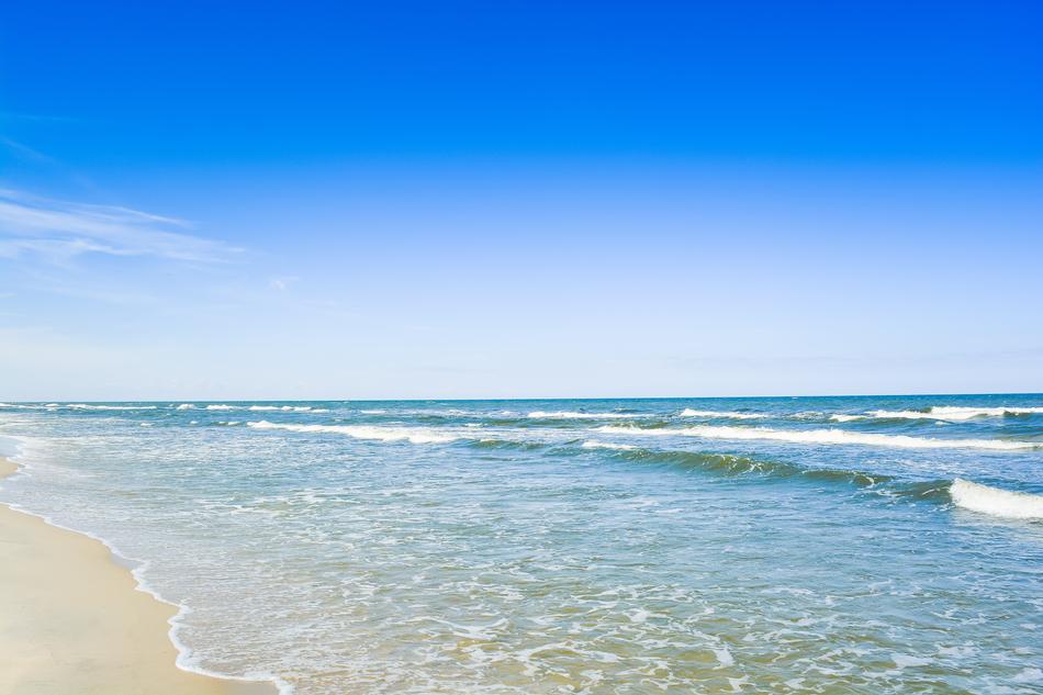 clear Sea waves splashing Sand beach at Summer