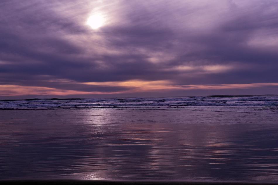 purple sunset on the horizon over the sea