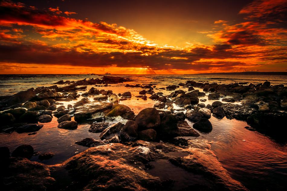 Fire in sky over seashore, uk, england, Filey Brigg