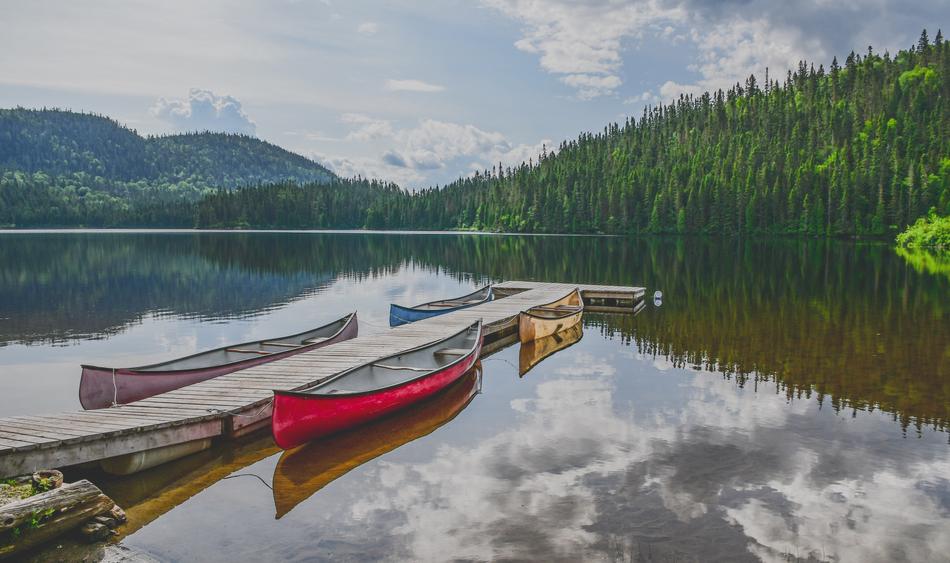 canoe at the wooden pier in Quebec, Canada