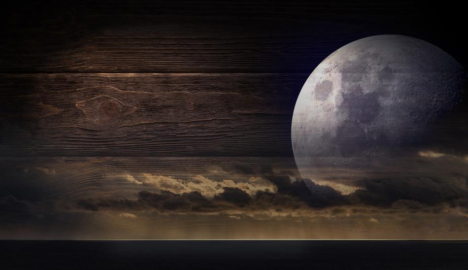 full moon and clouds on the background of wood planks