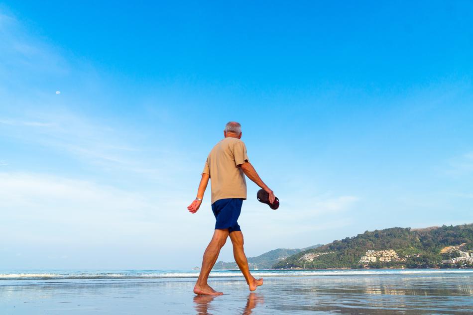 Beach walking Senior