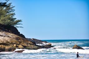 surfer on ocean coast