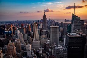 Beautiful cityscape of Manhattan, New York City, USA at colorful sunset
