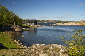 house on the river bank in sweden