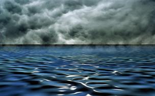 Storm clouds over water in a picturesque landscape