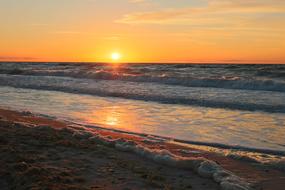 waves by the ocean at dusk