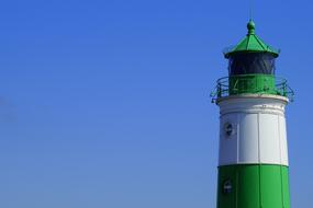 white green lighthouse on the Baltic Sea
