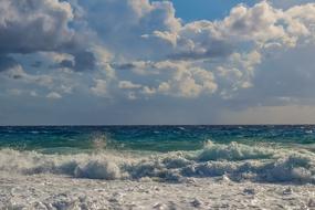 Beautiful green and blue sea with white waves on the seascape in Ayia Napa, Cyprus, Greece