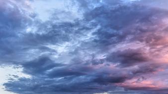 evening sky with clouds with purple glow