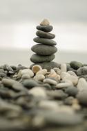 balanced stone tower on pebbles