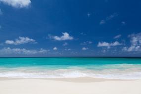 warm sand on the beach and turquoise ocean
