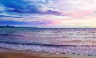 blue-pink twilight over the surf