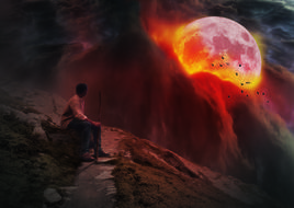wanderer against the background of a red fiery moon